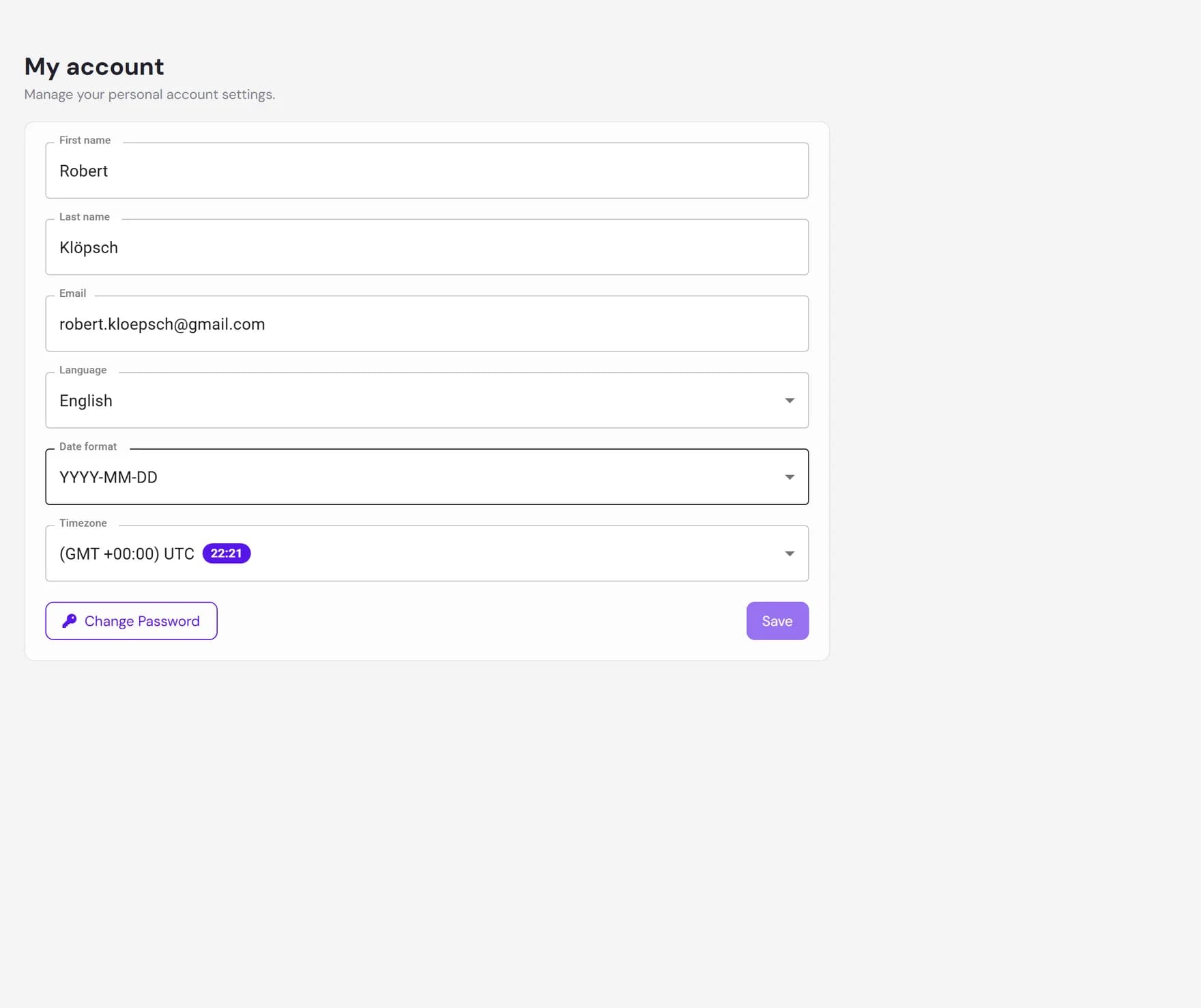 The account settings page showing first name, last name, email, language, date format and timezone fields